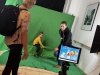 Jugendclub an der Green-Screen-Wand